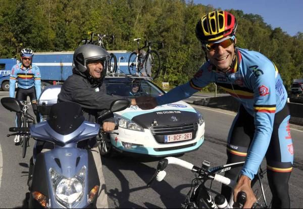 Former teamates Paolo Bettini sand Tom Boonen say hello