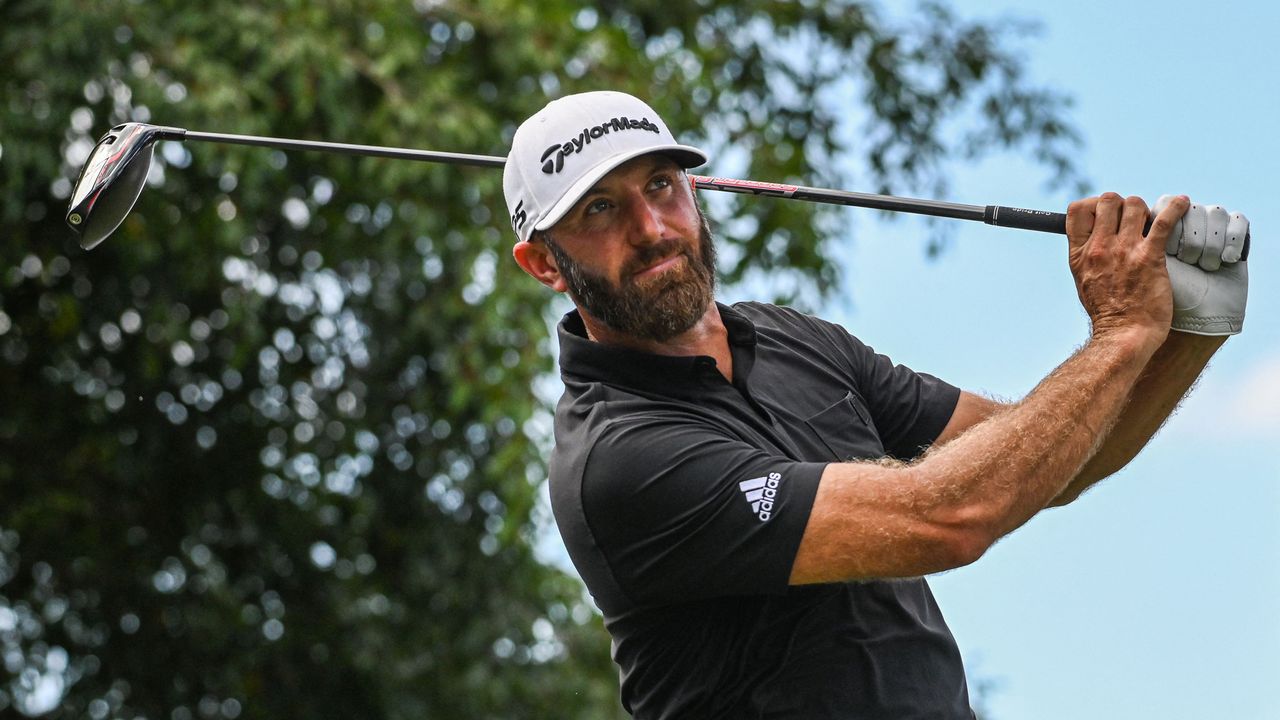 Dustin Johnson hits a drive