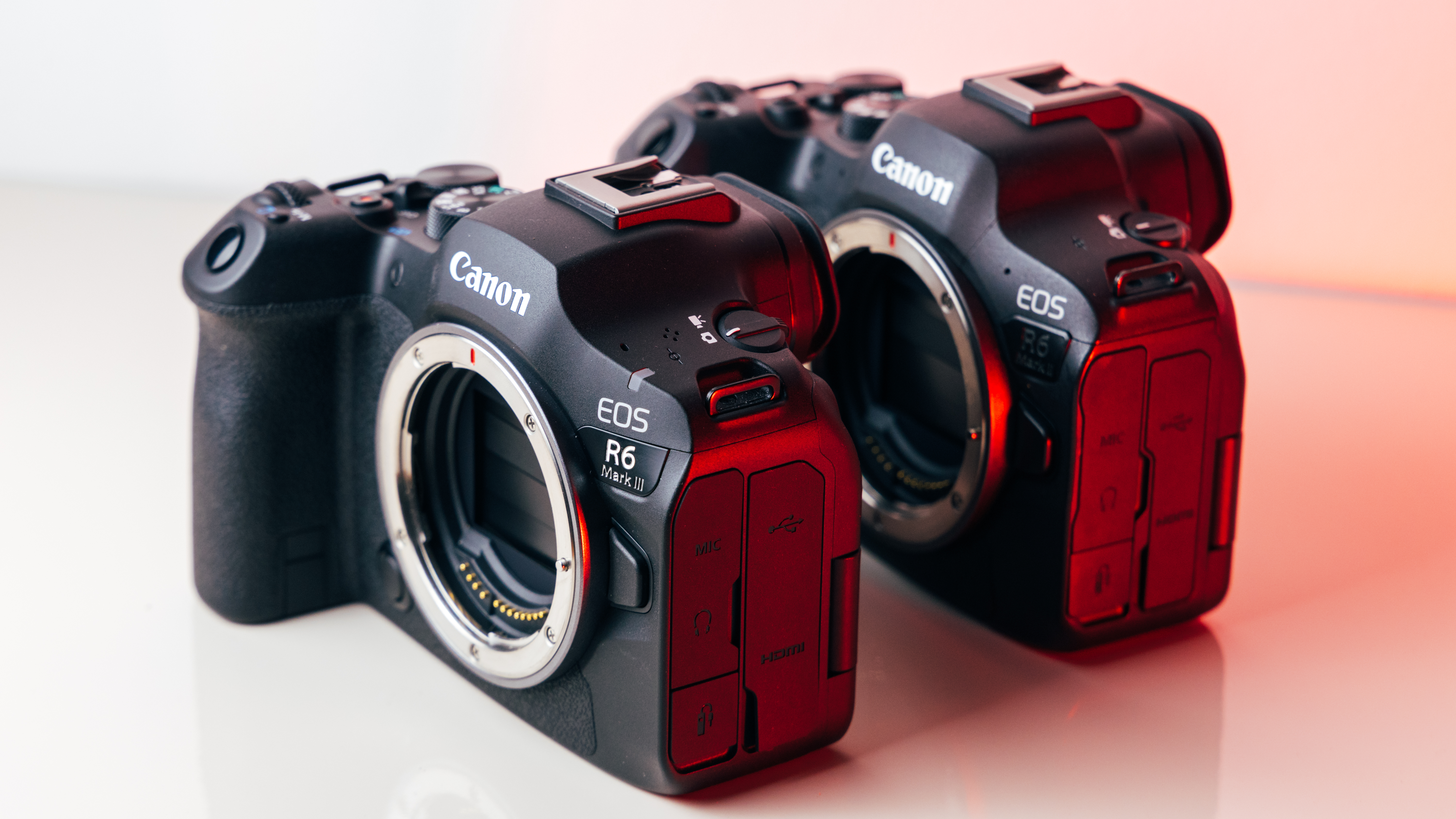 A shot of the Canon R6 Mark III lined up next to the R6 Mark II.