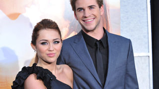 Actress Miley Cyrus and actor Liam Hemsworth arrive at the Los Angeles Premiere "The Last Song" at ArcLight Cinemas on March 25, 2010 in Hollywood, California.