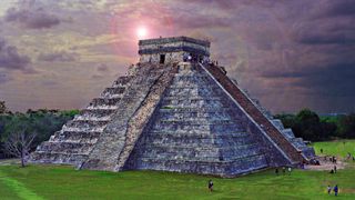 In this image we see Chichén Itzá at dusk. It is a large step pyramid built by the Maya people.