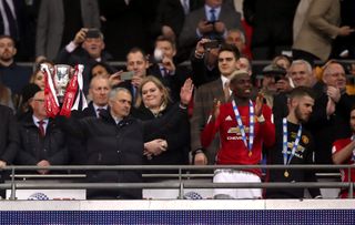 Jose Mourinho with the trophy after Manchester United beat Southampton