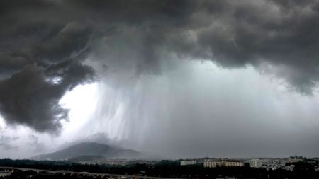 A stock image of a storm with heavy rain. 