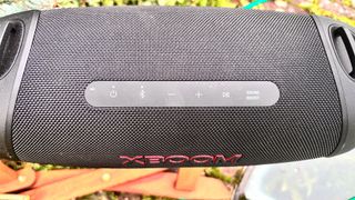 LG XBoom Go XG8T wireless speaker top down view showing controls