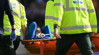 Ben Godfrey is stretchered off after suffering a serious injury against Chelsea at Goodison Park.