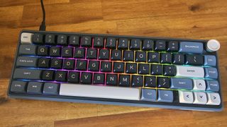 Our favorite 60% budget gaming keyboard, the Royal Kludge R65, is back down to just $44 with coupon at Amazon, its lowest-ever price. This wired clacker delivers excellent sound and feel for the price, thanks to lubed switches, a gasket mount, and silicone pads. It also has a metal knob and QMK/VIA support.