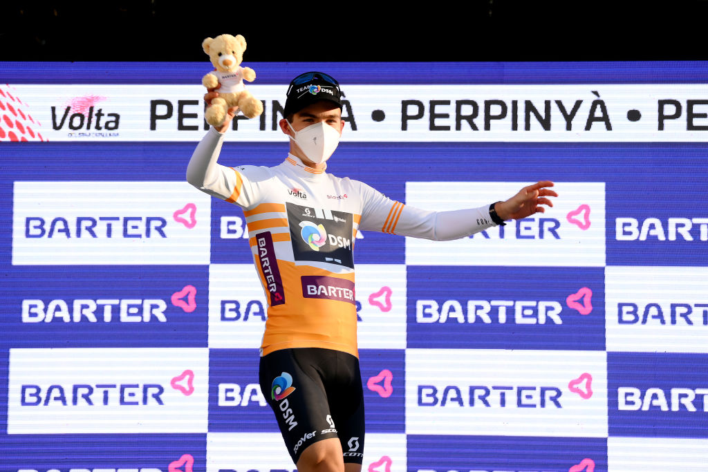 PERPIGNAN FRANCE  MARCH 22 Jonas Iversby Hvideberg of Norway and Team DSM celebrates winning the best yellow young jersey in the podium ceremony after the 101st Volta Ciclista a Catalunya 2022  Stage 2 a 2024km stage from LEscala to Perpignan  VoltaCatalunya101  WorldTour  on March 22 2022 in Perpignan France Photo by David RamosGetty Images