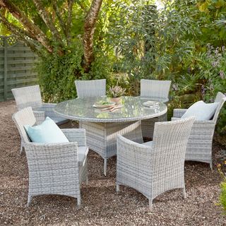A rattan garden table and chairs