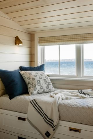 coastal guest bedroom with storage