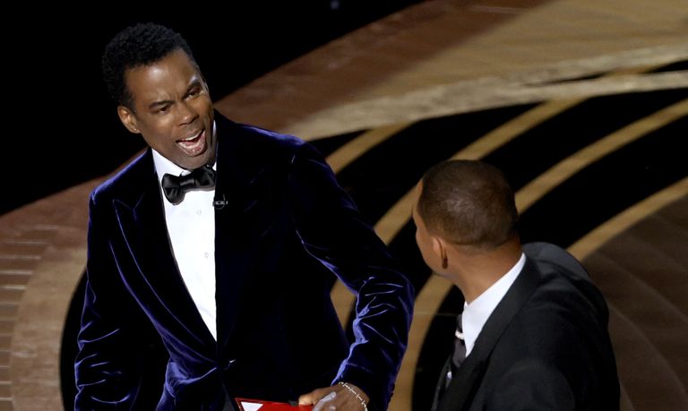 Will Smith appears to slap Chris Rock onstage during the 94th Annual Academy Awards at Dolby Theatre on March 27, 2022 in Hollywood, California.Will Smith apologizes to Chris Rock