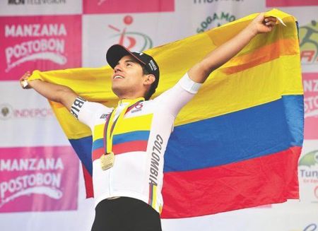 Edwin Avila celebrates on the podium after winning the 2016 Colombian road race title.