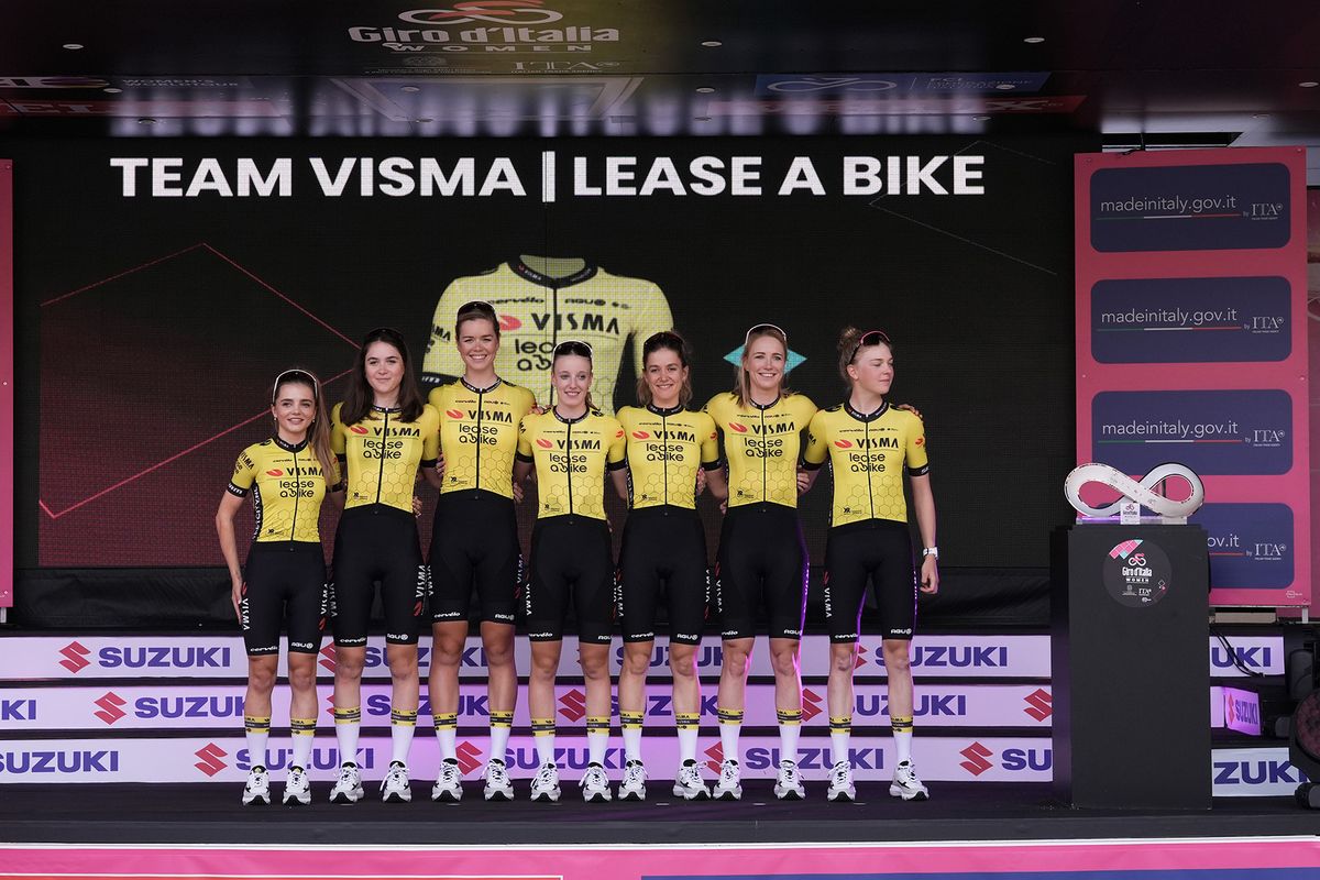 Visma-Lease a Bike on stage at the 2024 Giro d'Italia Women at the teams presentation at the Piazza della Loggia in Brescia