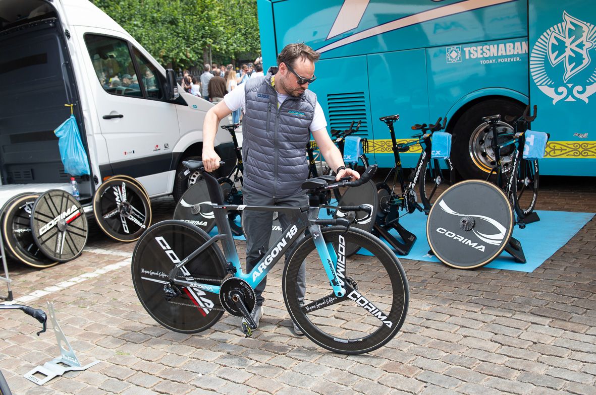 Jakob Fuglsang's bike is wheeled to the team bus ahead of the stage start