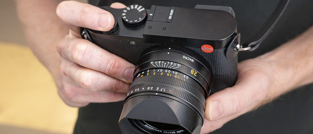 Leica Q3 camera in the hand