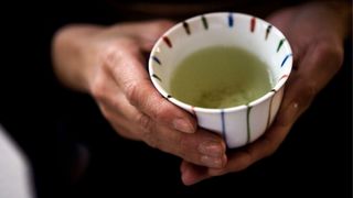 Mug of green tea