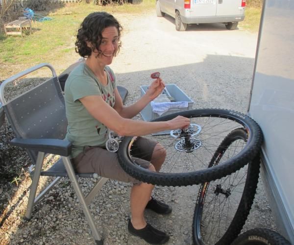 Mary McConneloug helps out with mechanic duties