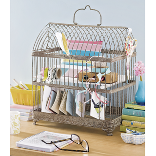 desktop storage with birdcage and stationery