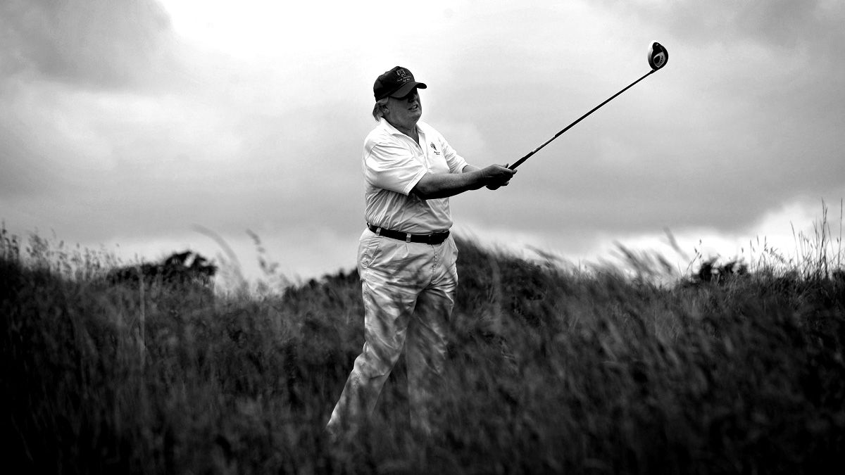 US tycoon Donald Trump plays a stroke as he officially opens his new multi-million pound Trump International Golf Links course in Aberdeenshire, Scotland, on July 10, 2012. Work on the course