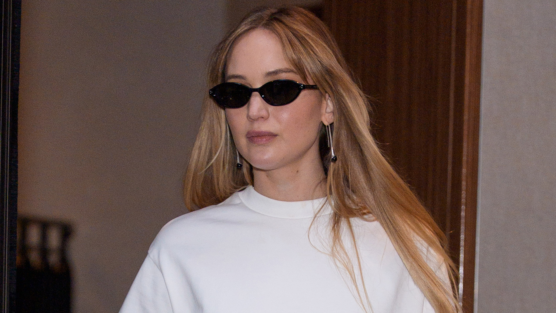 Jennifer Lawrence wore the scarf belt trend again in November 2025 for fall