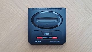 Sega Mega Drive Mini 2 review; a top down photo of a small retro games console