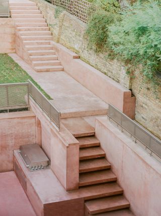 Pigment House by unknown works is a pink concrete house