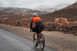 Male cyclist wearing the 7mesh Mk3 Cargo Bib Shorts in Morocco