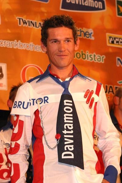 Robbie McEwen forces a smile, despite the 'clownish' outfit