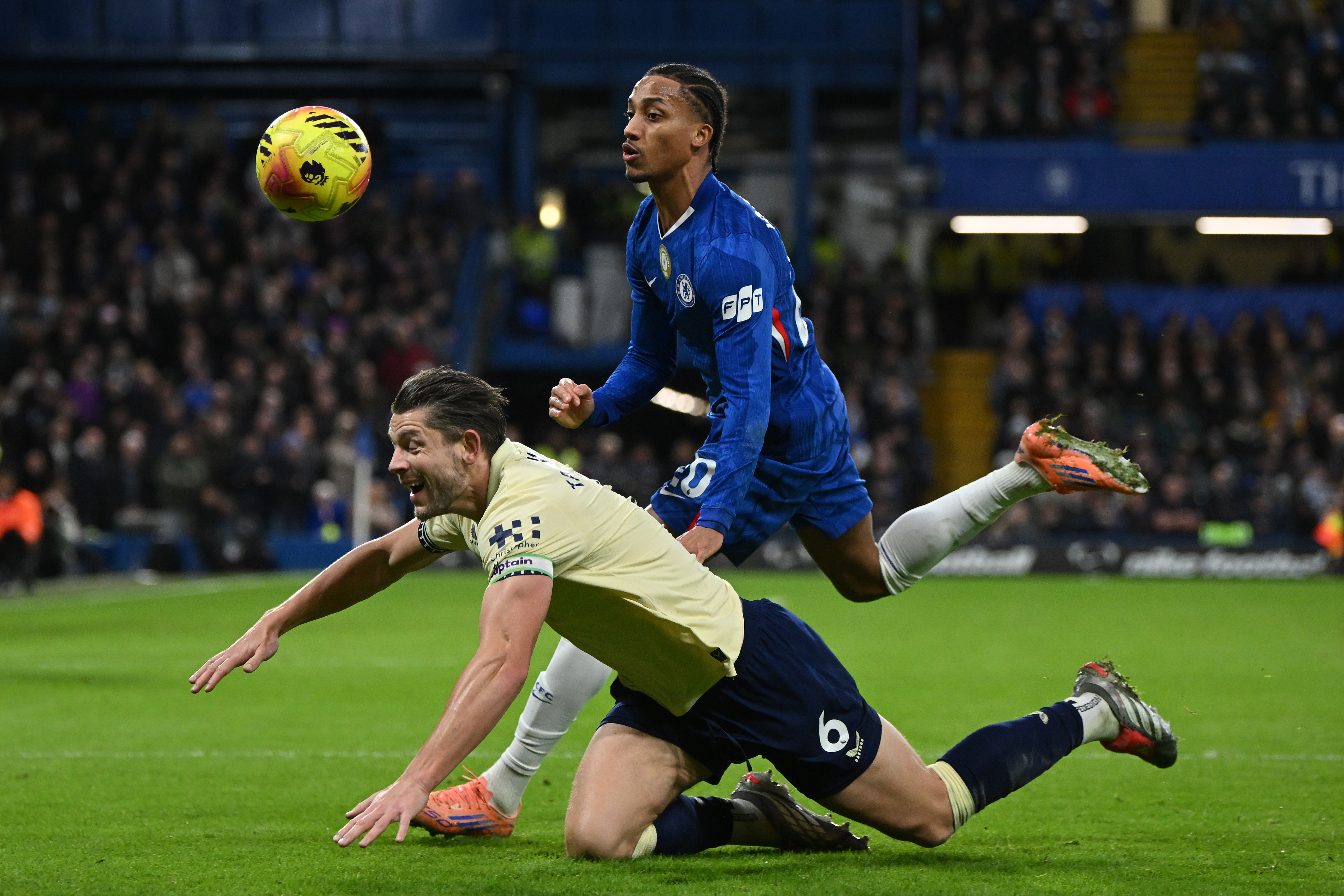 Joao Pedro and James Tarkowski wrestle for the ball during the reverse fixture earlier this season