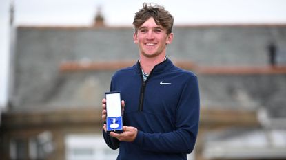 Calum Scott with the silver medal for finishing top amateur in The Open of 2024 GettyImages-2162321756 