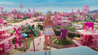 Backshot of Barbie overlooking Barbie world from her dream house