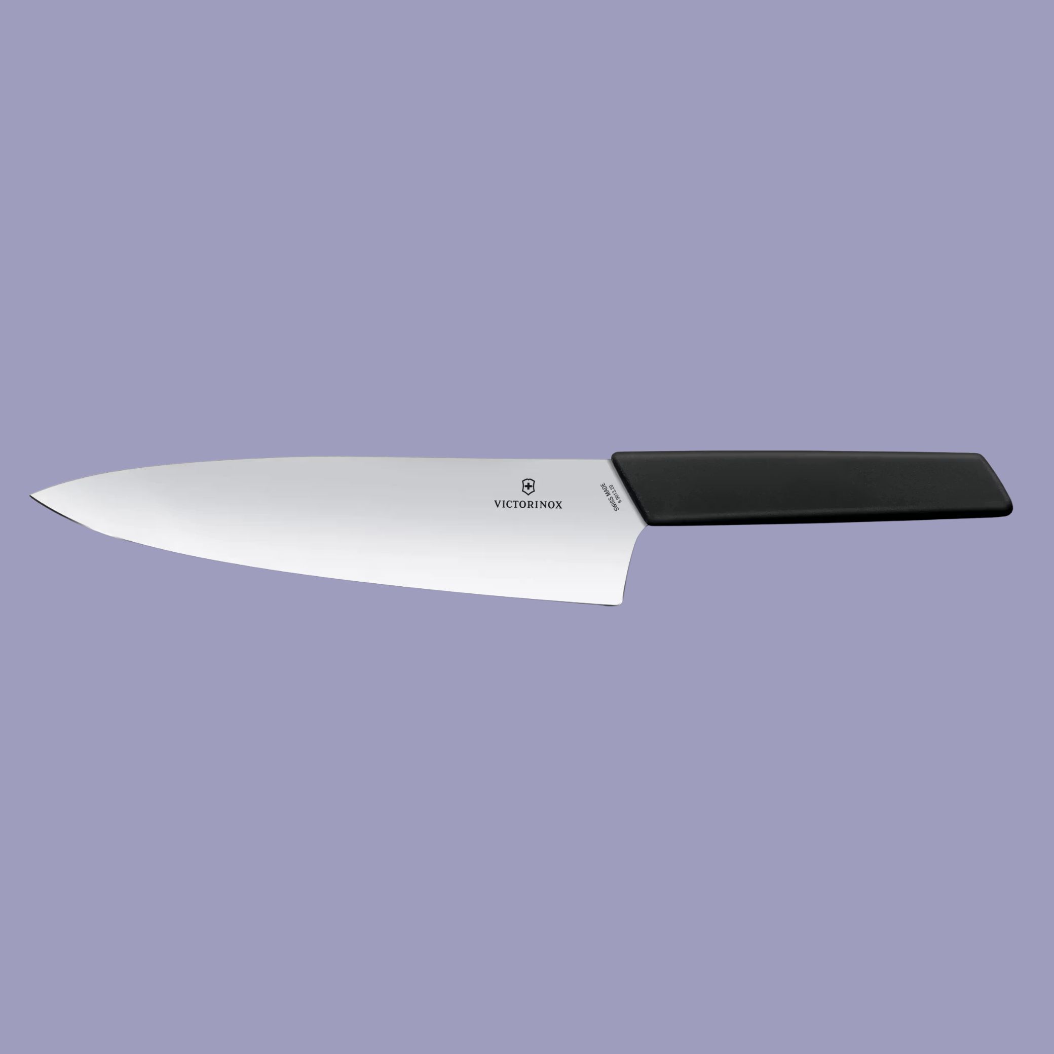 Victorinox Swiss Modern Chef's Knife, 20 Cm against lilac background.