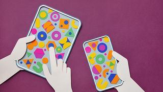 An image of two people using a colourful tablet and phone representing UX research for beginners