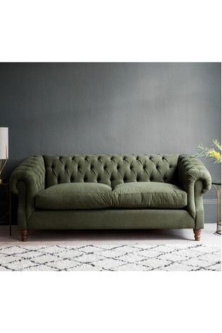 chesterfield style green sofa bed from next