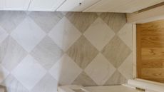 a checkerboard white and grey floor