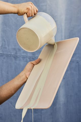 Pouring glaze on Heath Ceramics