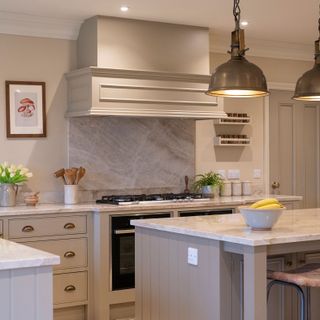 grey shaker kitchen with metal pendant lights