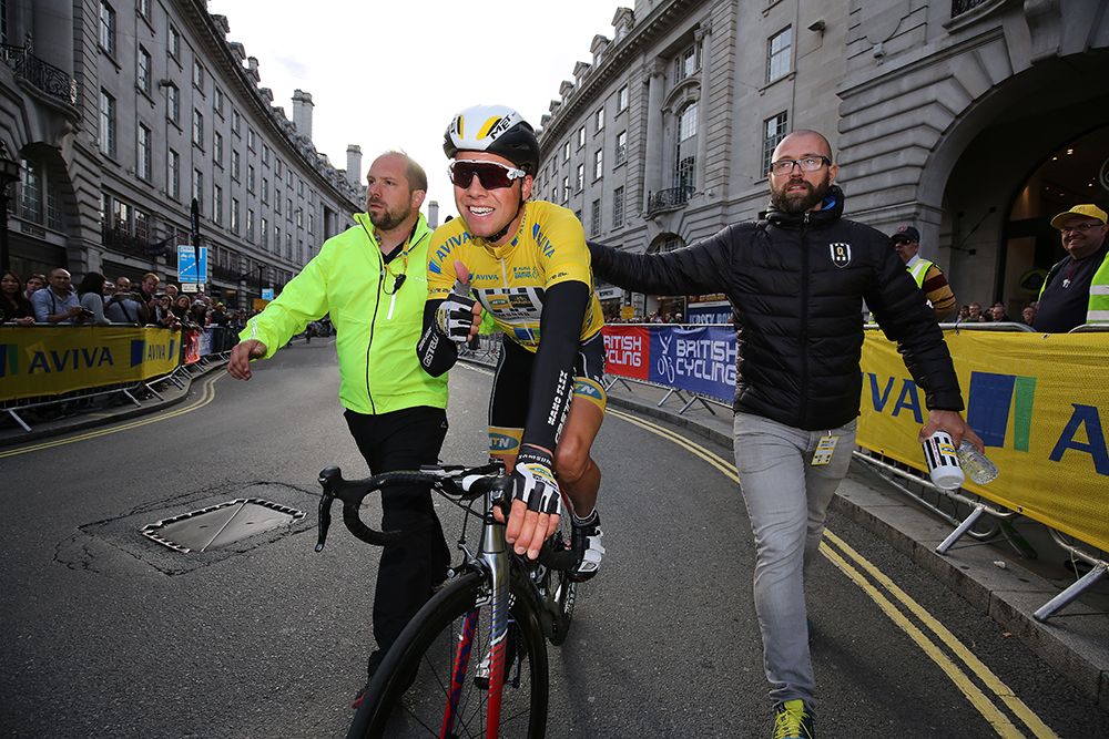 Edvald Boasson Hagen (MTN-Qhubeka) is escorted to the podium