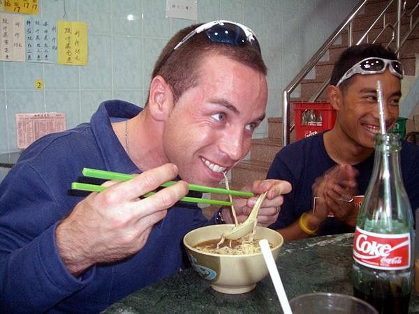 Joe Papp and Daniel Lee enjoy a joke during lunch in Macau.