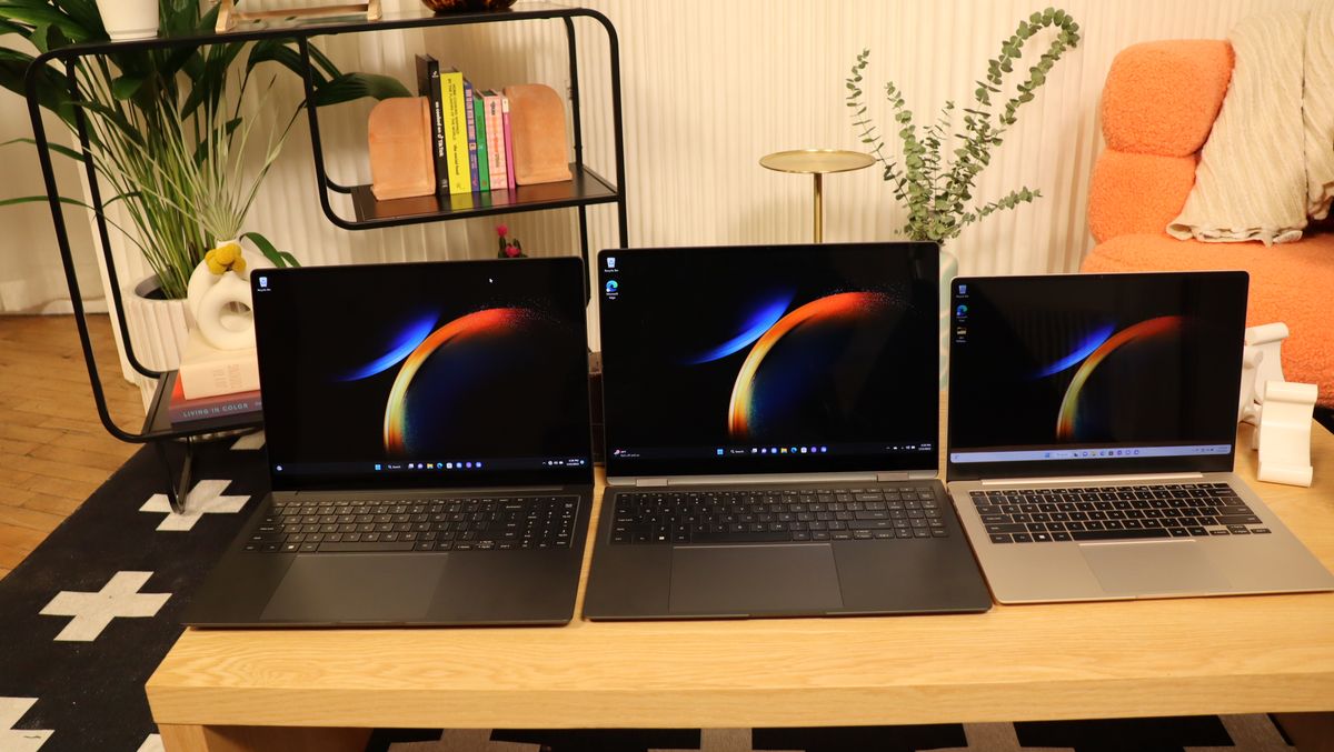Three Samsung Galaxy Book3 sat next to each other on a wooden table