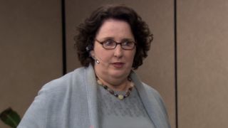 Phyllis wearing a headset in The Office