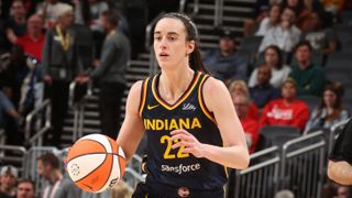 Caitlin Clark #22 of the Indiana Fever handles the ball during the WNBA preseason, ahead of the Indiana Fever vs Connecticut Suns