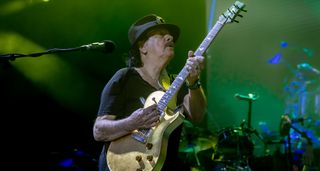Carlos Santana plays his signature PRS at the Noches del Botanico festival, in Spain.