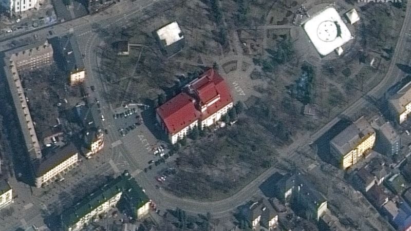 This photo, taken by Maxar Technologies’ WorldView-2 satellite on March 14, 2022, shows the world &quot;children&quot; written in front of and behind a theater in the Ukrainian city of Mariupol. According to news reports, the theater was bombed by Russian forces on March 16, 2022.