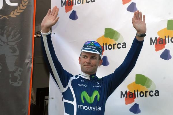 Race winner Jose Joaquin Rojas (Movistar) steps onto the podium.