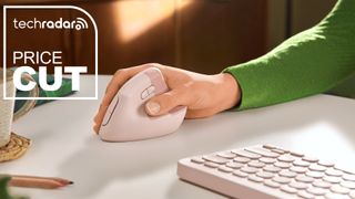 A hand around the Logitech Lift Ergonomic Vertical mouse in the Rose colour option