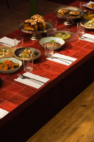 red table with food on