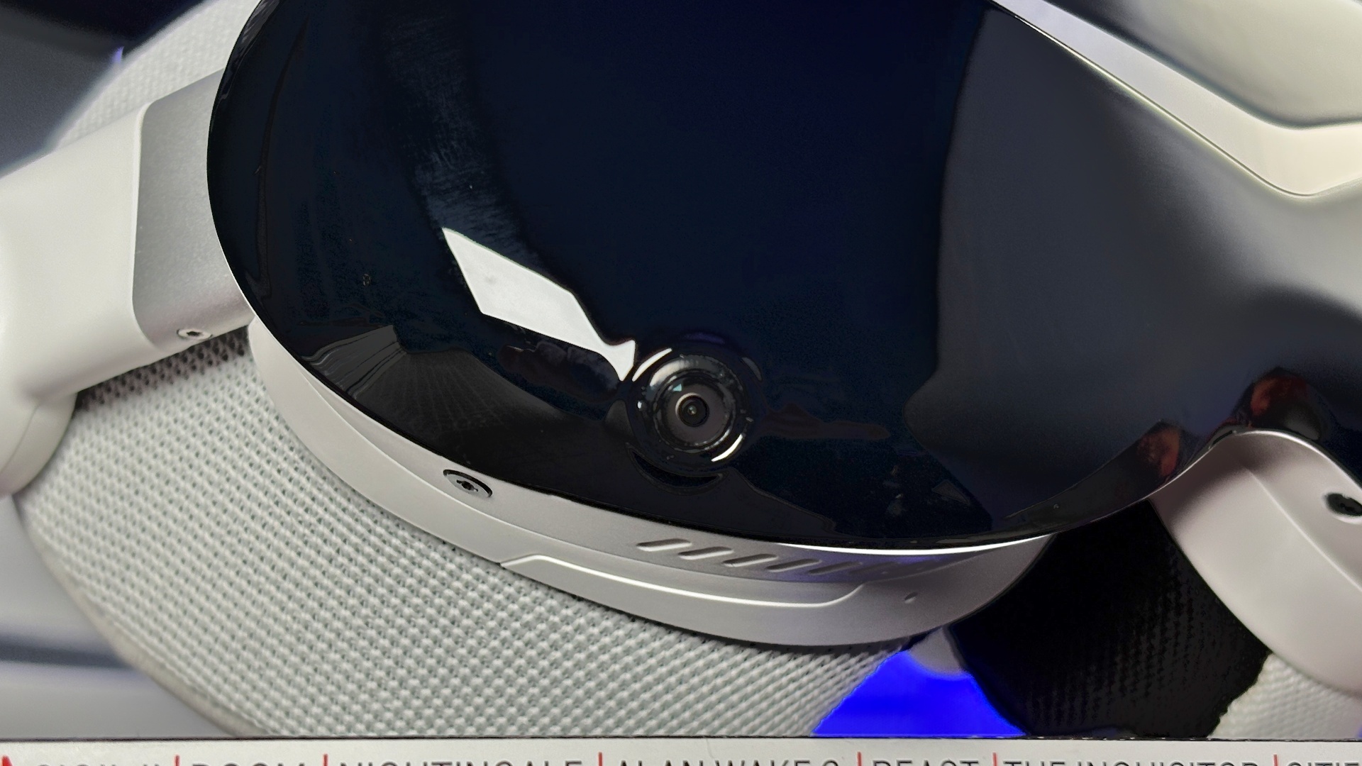 The Pimax Dream Air in white on a stack of PC Gamer magazine.