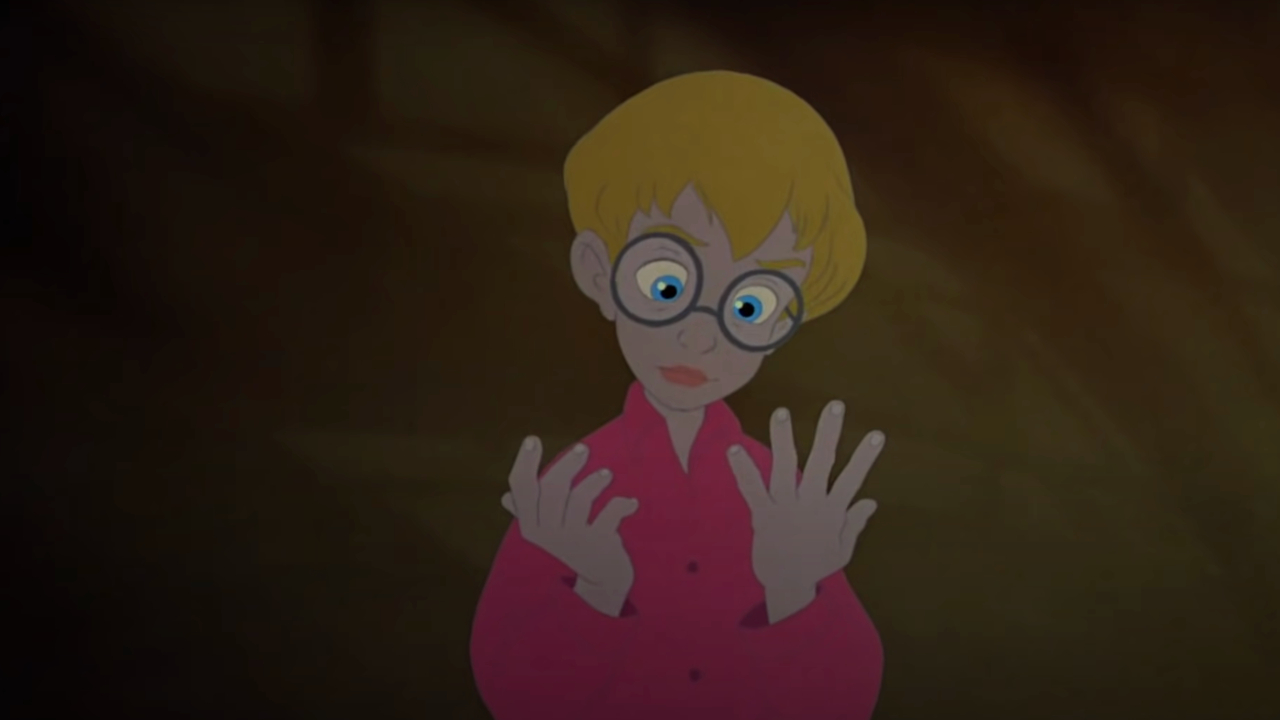 Macaulay Culkin examines his animated hands in The Pagemaster.
