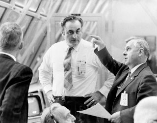 Apollo program director Rocco Petrone (center) is seen in 1971 in the launch control center that would later bare his name.