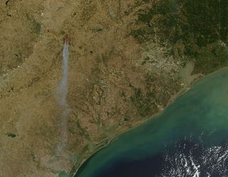 Bastrop County wildfires in Texas as seen from space by NASA satellites.